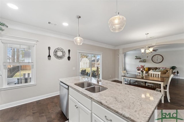 kitchen with baseboards, visible vents, dark wood-type flooring, a sink, and stainless steel dishwasher