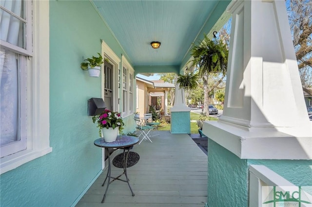 wooden deck with a porch