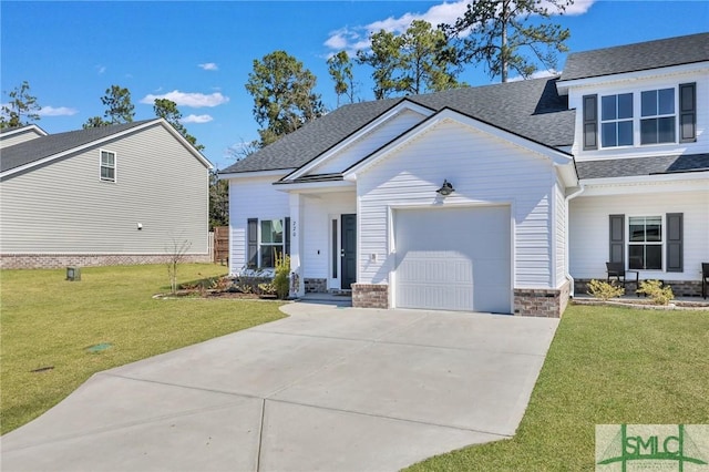 view of front of home featuring driveway, a front lawn, an attached garage, and a shingled roof