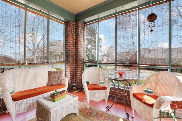 sunroom with a water view