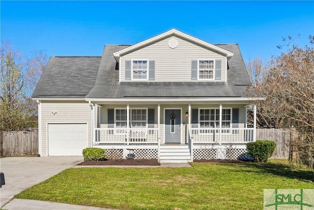 view of front facade with a porch, concrete driveway, a front lawn, and fence