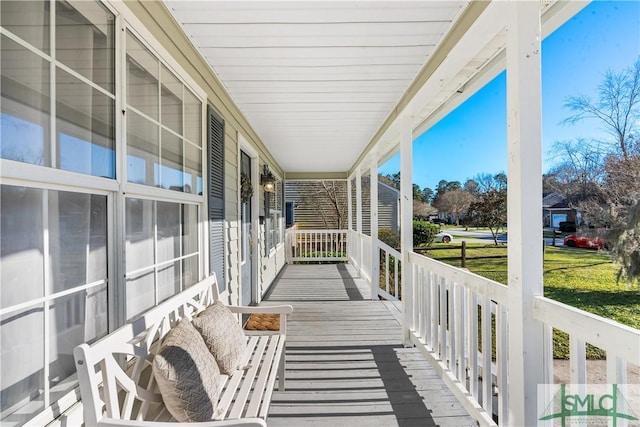 balcony featuring covered porch