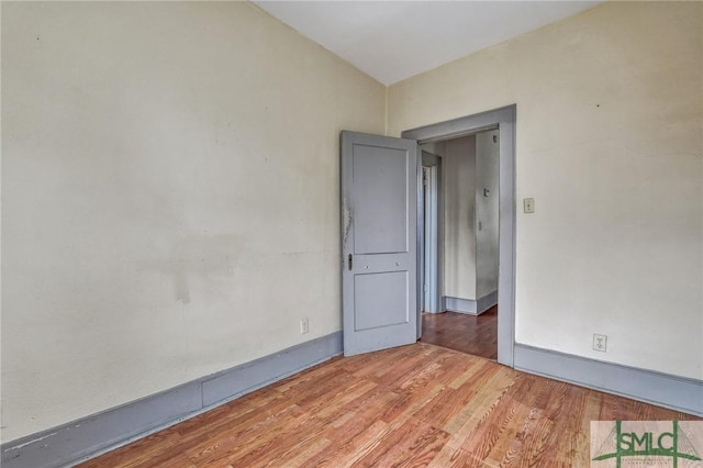 empty room with light wood-type flooring