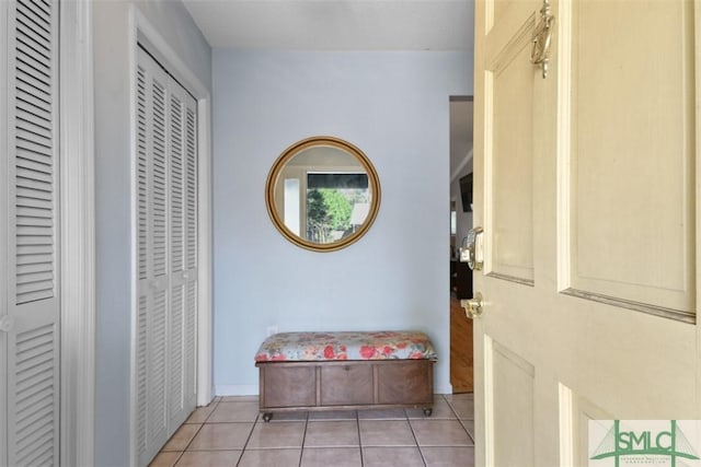 entrance foyer with light tile patterned flooring