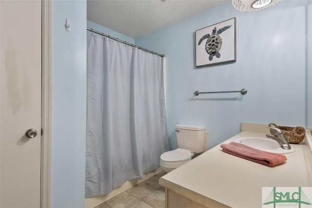 full bath with toilet, tile patterned floors, curtained shower, a textured ceiling, and vanity