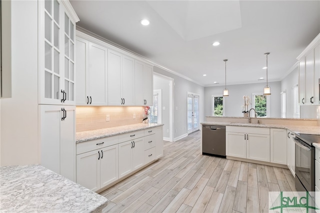 kitchen featuring a sink, white cabinets, black electric range, stainless steel dishwasher, and tasteful backsplash