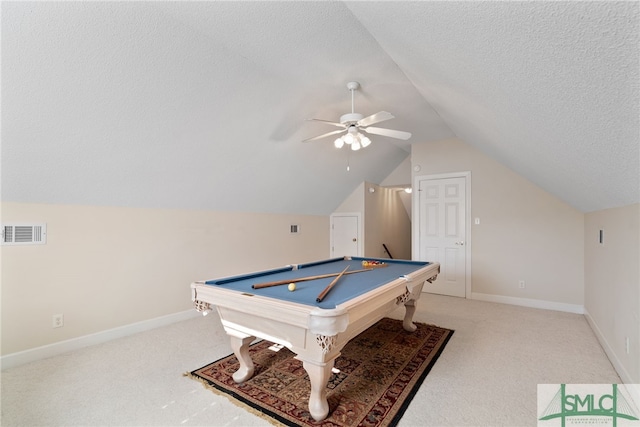 playroom with light colored carpet, pool table, visible vents, vaulted ceiling, and a textured ceiling