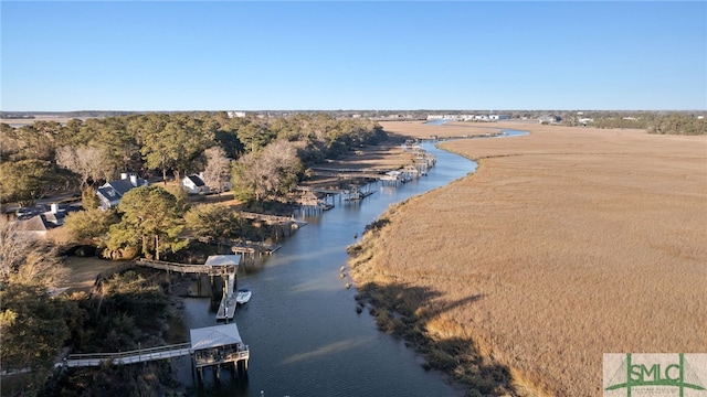 drone / aerial view featuring a water view