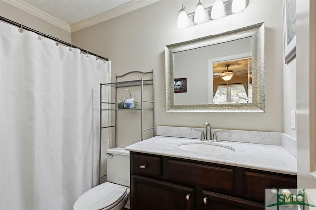 full bath with toilet, vanity, a ceiling fan, and ornamental molding