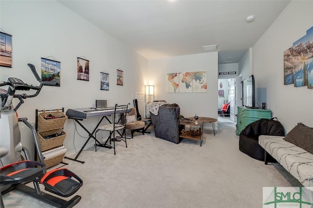 carpeted office featuring visible vents