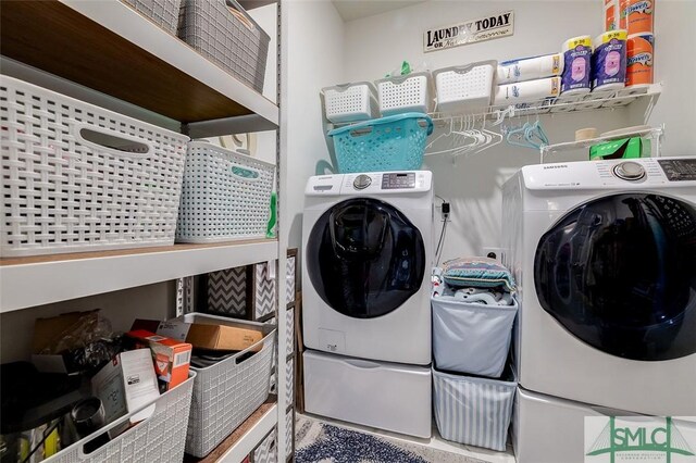 washroom with laundry area and separate washer and dryer