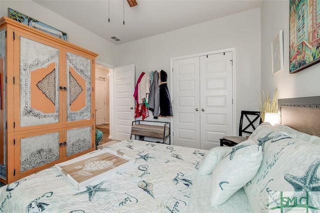 bedroom featuring a ceiling fan, visible vents, a closet, and french doors