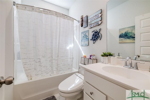 bathroom featuring toilet, shower / bath combination with curtain, and vanity