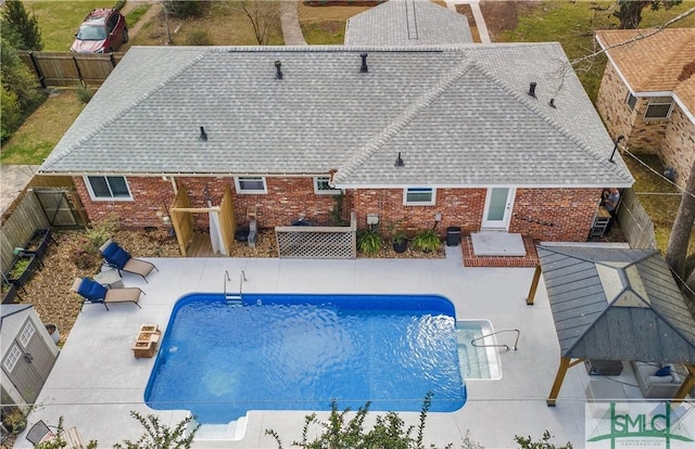 view of pool featuring a fenced in pool, a fenced backyard, and a patio