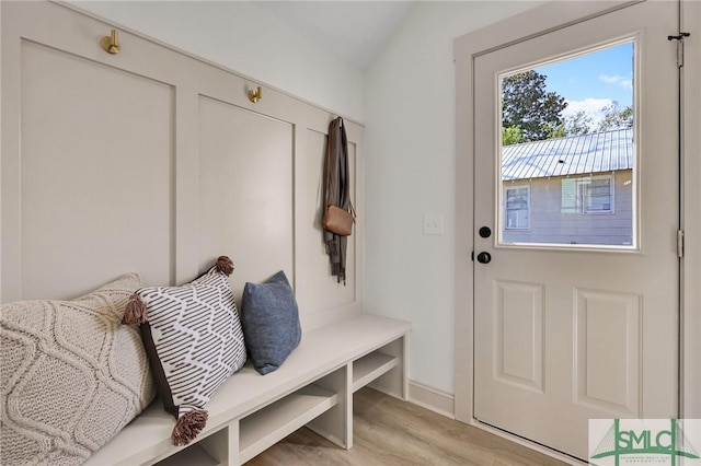 mudroom with light wood finished floors