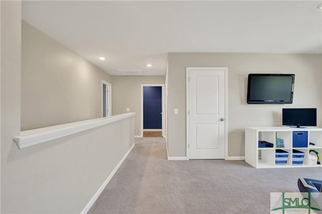 interior space featuring carpet, visible vents, baseboards, and recessed lighting