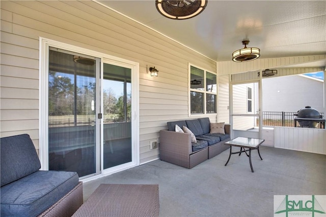 view of patio with outdoor lounge area and area for grilling