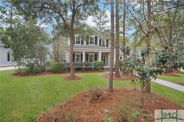 view of front facade with a front yard