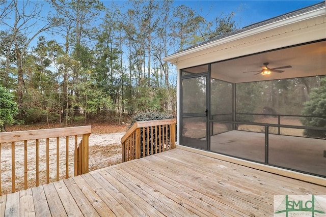 wooden terrace featuring a sunroom