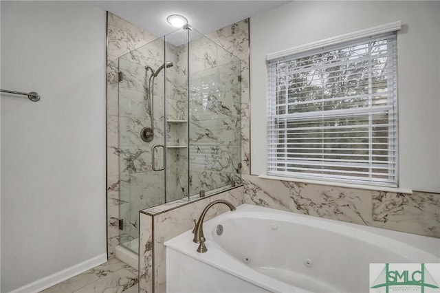 full bathroom with marble finish floor, baseboards, a jetted tub, and a marble finish shower