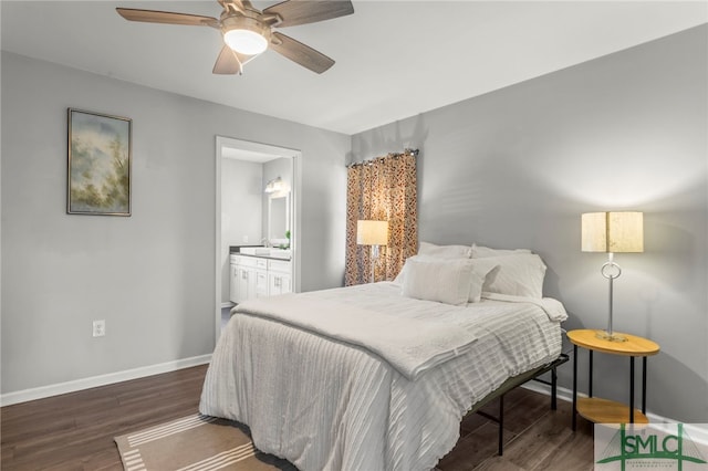 bedroom featuring ensuite bathroom, ceiling fan, wood finished floors, and baseboards