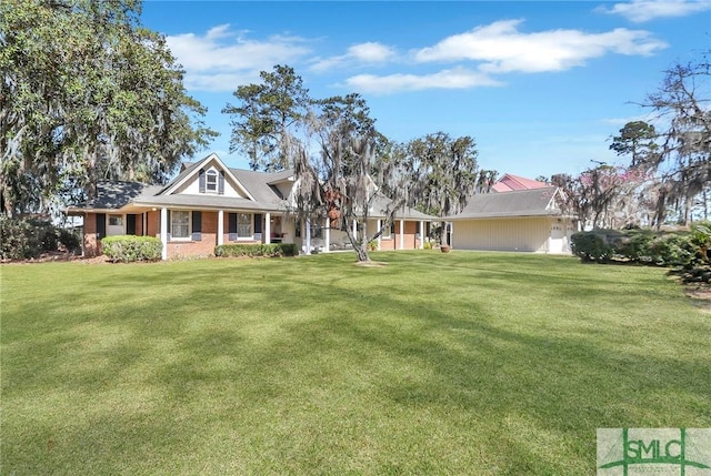 126 Grove Point Island Rd, Savannah, GA 31419 - view of front of home with a front yard and brick siding