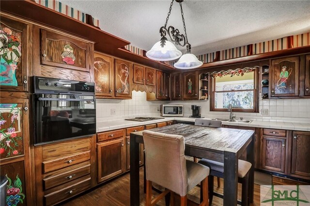 126 Grove Point Island Rd, Savannah, GA 31419 - kitchen featuring black oven, a sink, open shelves, stainless steel microwave, and gas stovetop