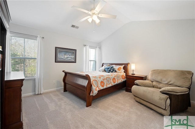 bedroom with lofted ceiling, light colored carpet, visible vents, a ceiling fan, and baseboards