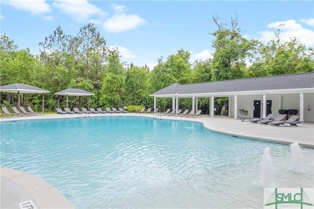 pool with a patio area