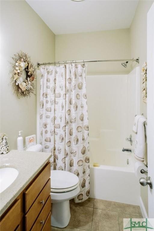 bathroom with tile patterned flooring, shower / bathtub combination with curtain, vanity, and toilet