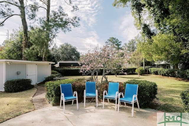 view of patio with an outdoor structure