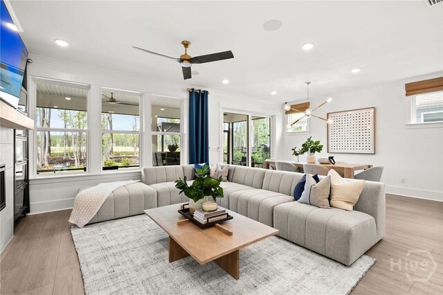 323 Birch Dr, Richmond Hill, GA 31324 - living room with baseboards, ceiling fan, wood finished floors, and recessed lighting