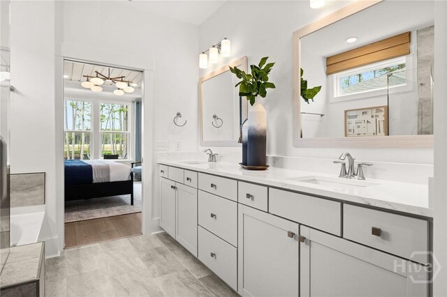323 Birch Dr, Richmond Hill, GA 31324 - bathroom with ensuite bathroom and double vanity