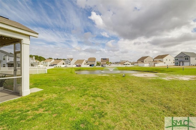 view of yard featuring a residential view