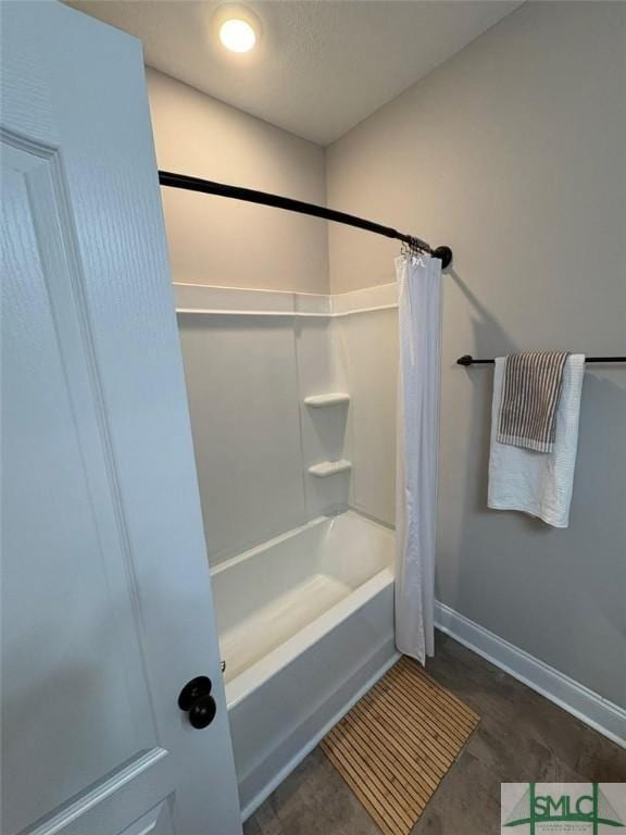 119 Sams Dr, Guyton, GA 31312 - bathroom with baseboards and shower / bath combination with curtain