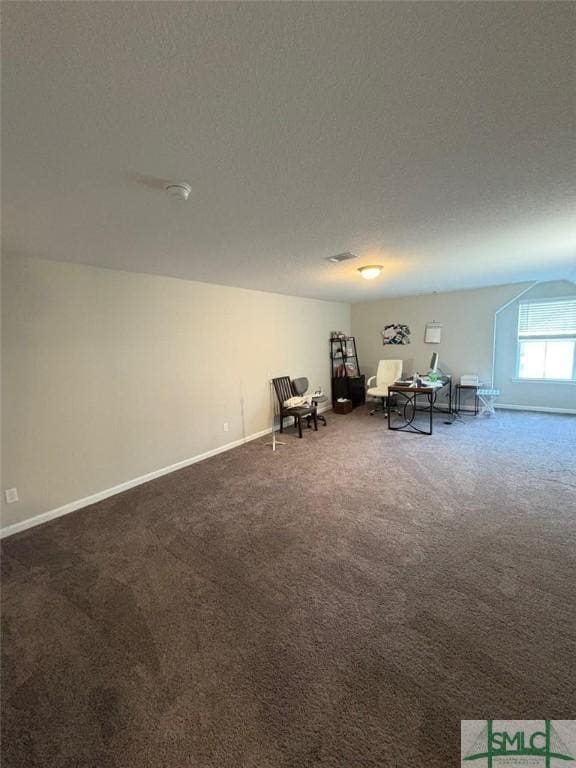 119 Sams Dr, Guyton, GA 31312 - sitting room featuring carpet, a textured ceiling, and baseboards