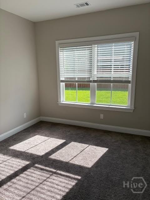 119 Sams Dr, Guyton, GA 31312 - carpeted spare room featuring baseboards