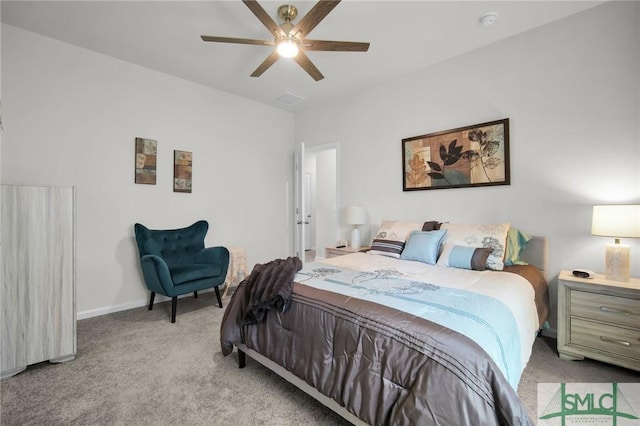 bedroom featuring light carpet, ceiling fan, and baseboards