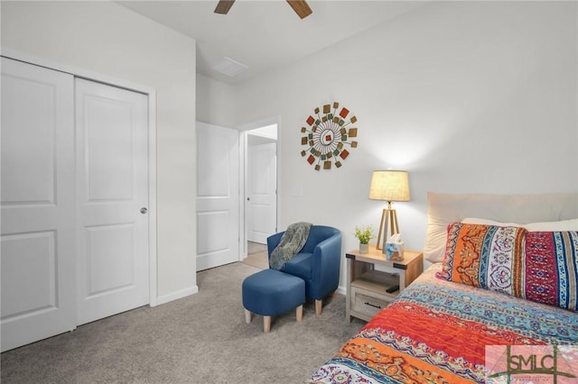 carpeted bedroom featuring a ceiling fan and a closet