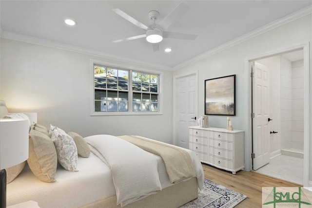 bedroom featuring ornamental molding, light wood-type flooring, connected bathroom, and recessed lighting