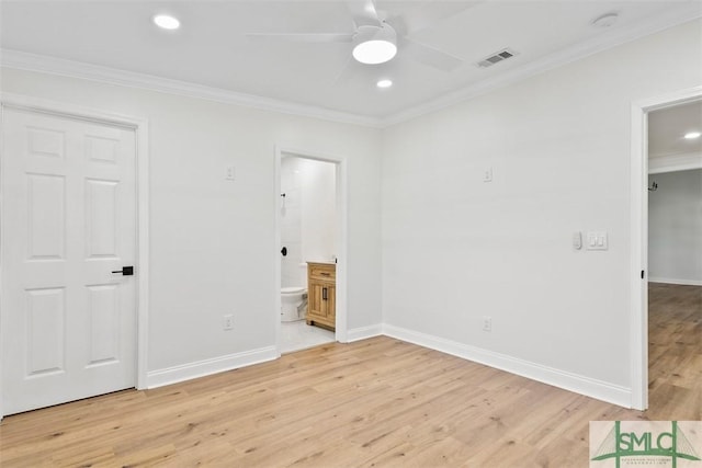 unfurnished bedroom with light wood finished floors, baseboards, visible vents, and crown molding