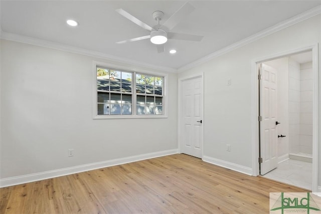 unfurnished bedroom featuring ornamental molding, recessed lighting, light wood-style flooring, and baseboards