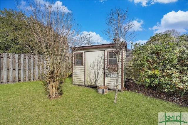 view of shed with fence