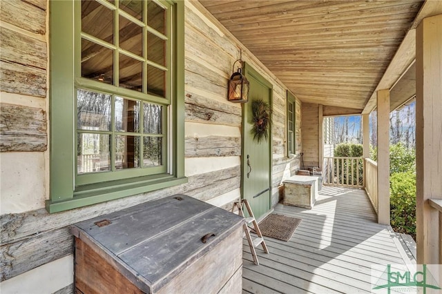 wooden deck featuring covered porch