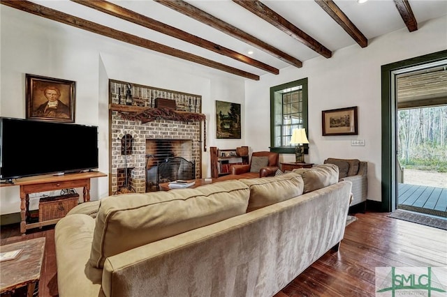 living room with dark wood-style floors, a fireplace, beam ceiling, and baseboards