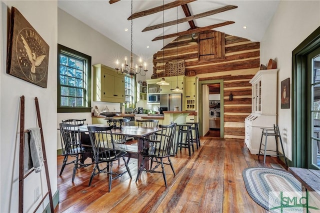 dining room featuring a chandelier, high vaulted ceiling, dark wood-style flooring, and beam ceiling