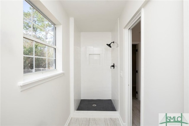 full bathroom featuring a shower stall