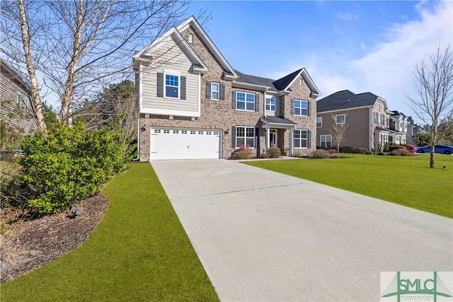 view of front of property featuring a front yard, concrete driveway, brick siding, and an attached garage