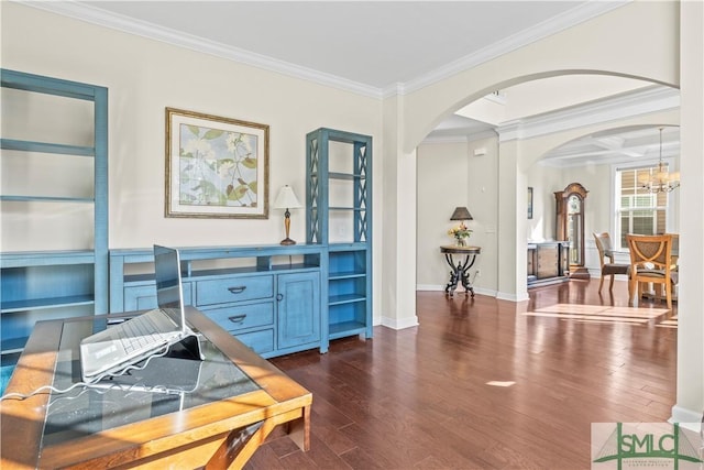 sitting room with arched walkways, a notable chandelier, baseboards, dark wood-style floors, and crown molding