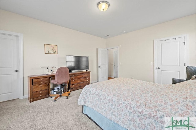 bedroom featuring carpet